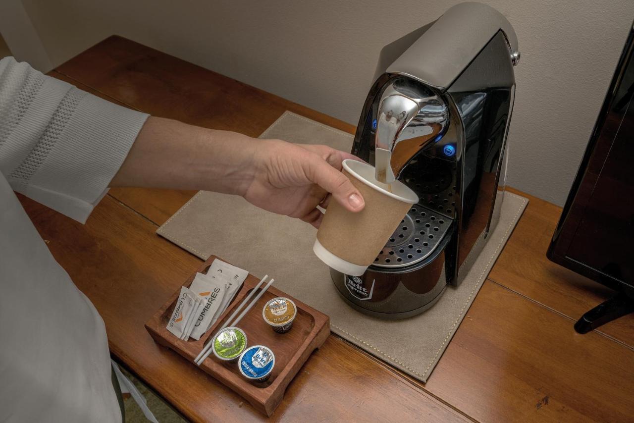 Wyndham Puerto Varas Pettra المظهر الخارجي الصورة A Nespresso coffee machine